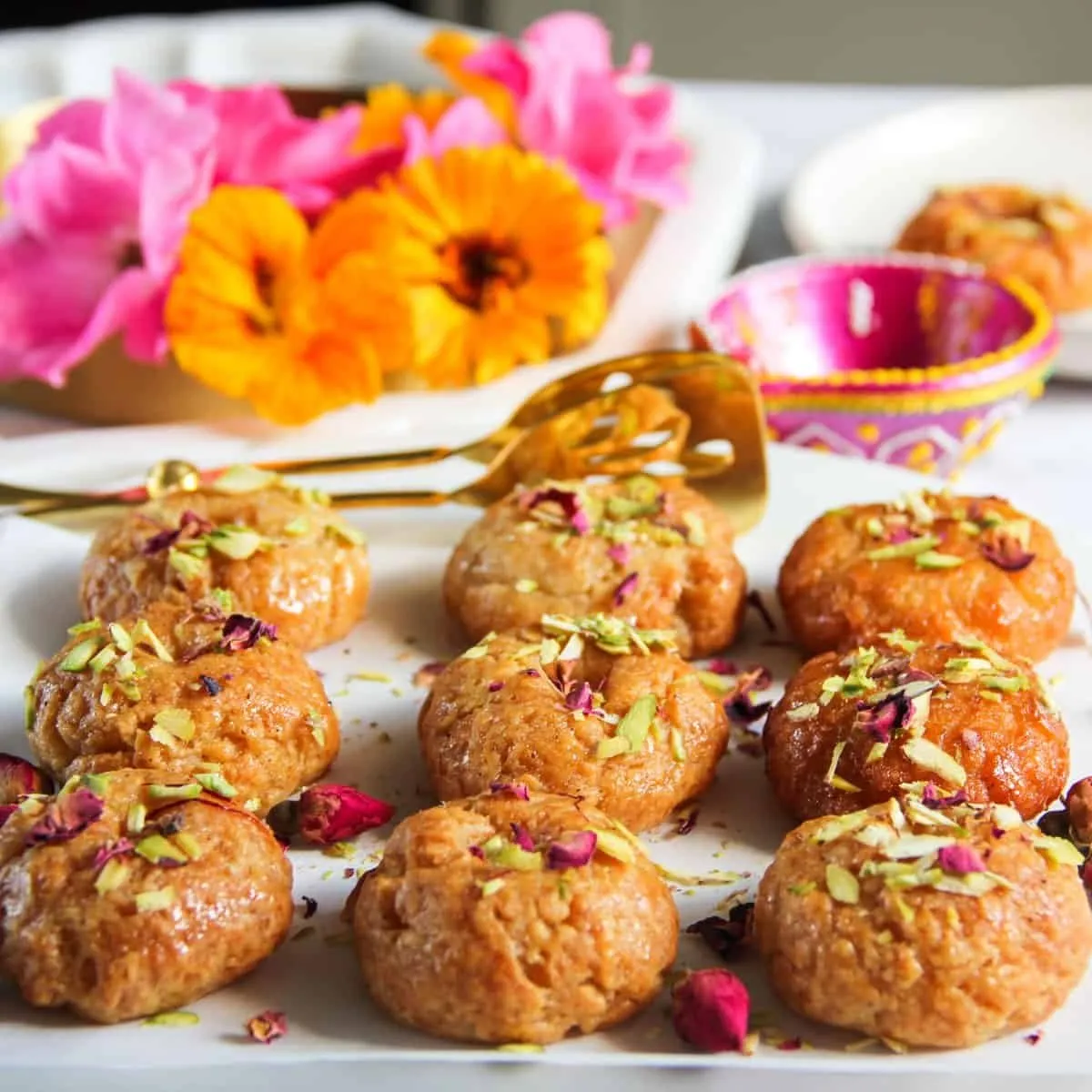 હોળીના તહેવારને બનાવો ખાસ: બહારથી ક્રિસ્પી અને અંદરથી રસદાર બાલુશાહી બનાવવાની ટિપ્સ 2 sweet.1.jpg