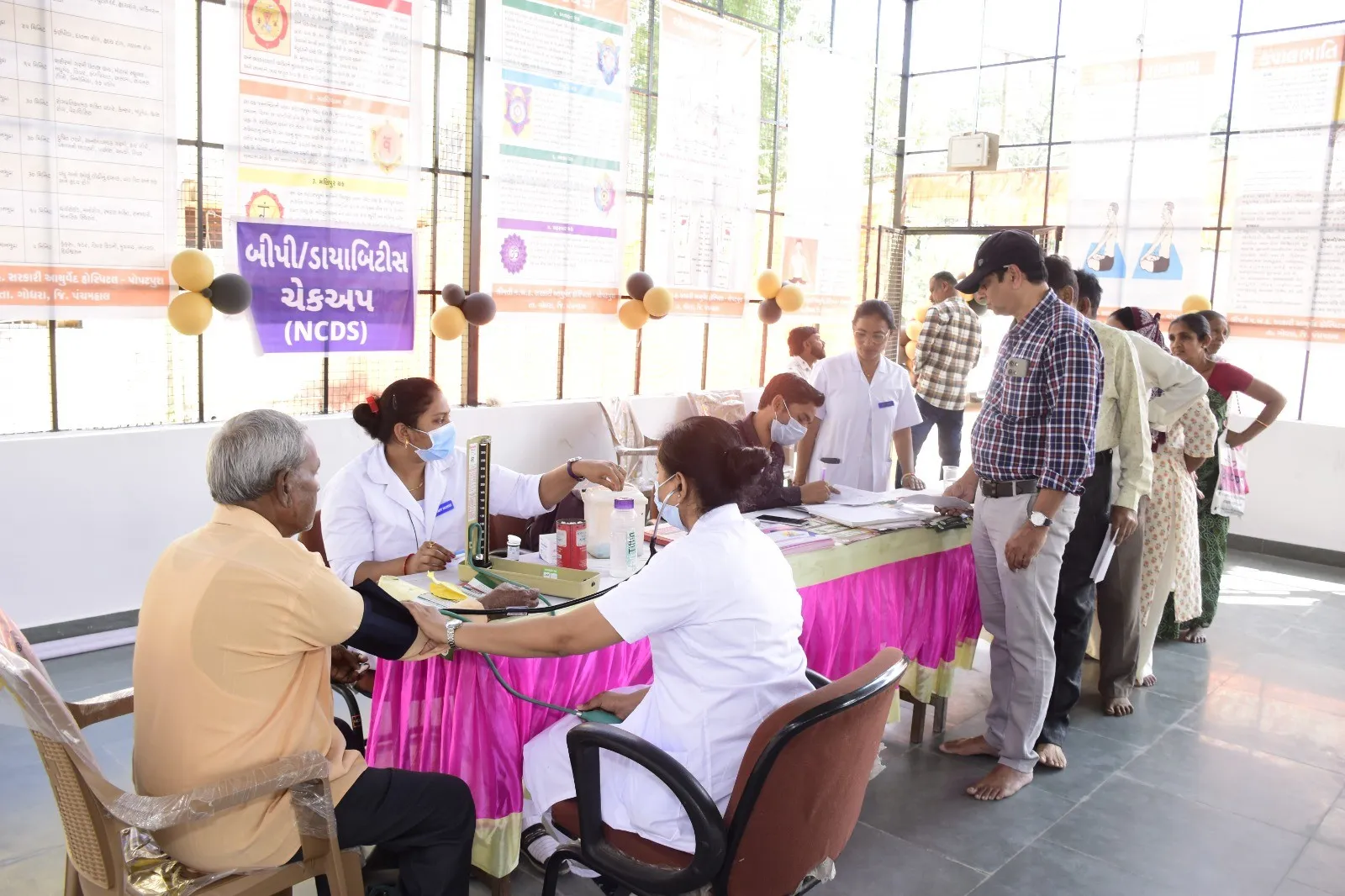 પંચમહાલના પોપટપુરામાં આયુષ મેગા નિદાન કેમ્પ અને નૂતન યોગા હૉલનું ભવ્ય લોકાર્પણ 2 Panchmahal AYUSH Mega Health Camp.png